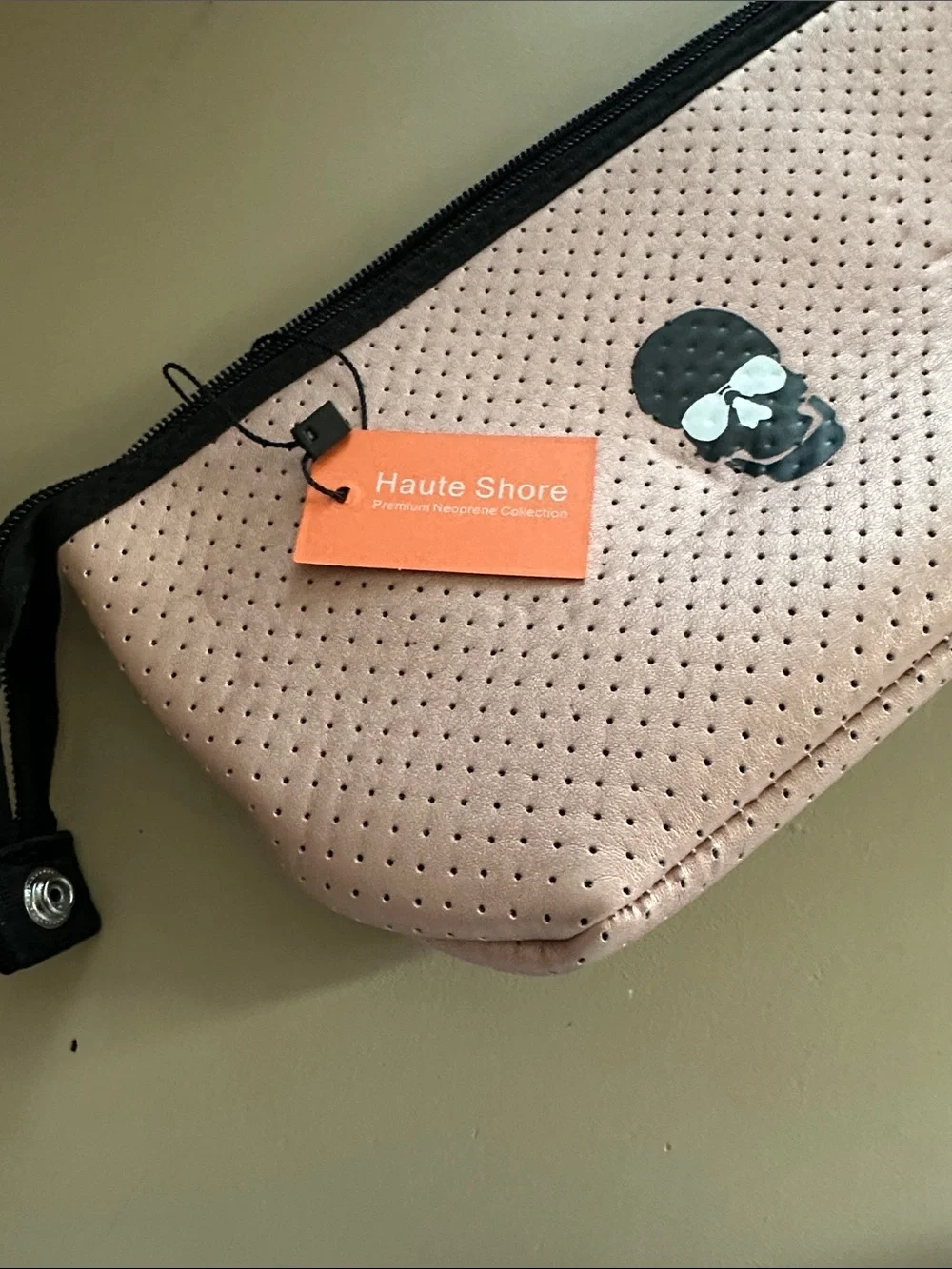Pink Perforated Neoprene Cosmetic Pouch with Skull Accent